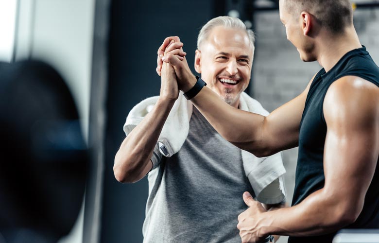 two men high-fiving