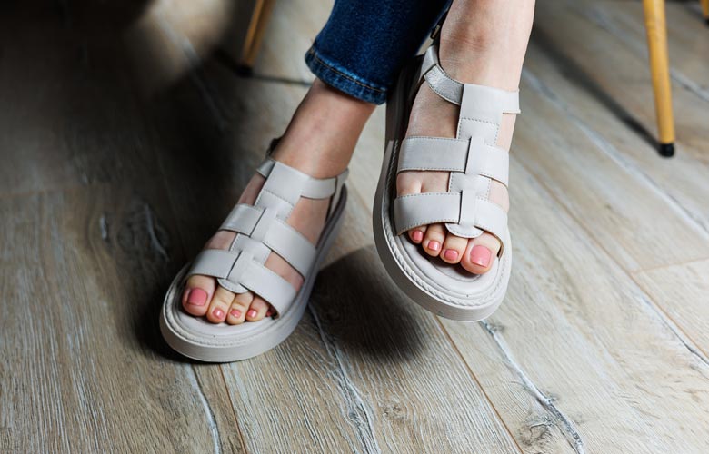 close up of woman's feet in sandals