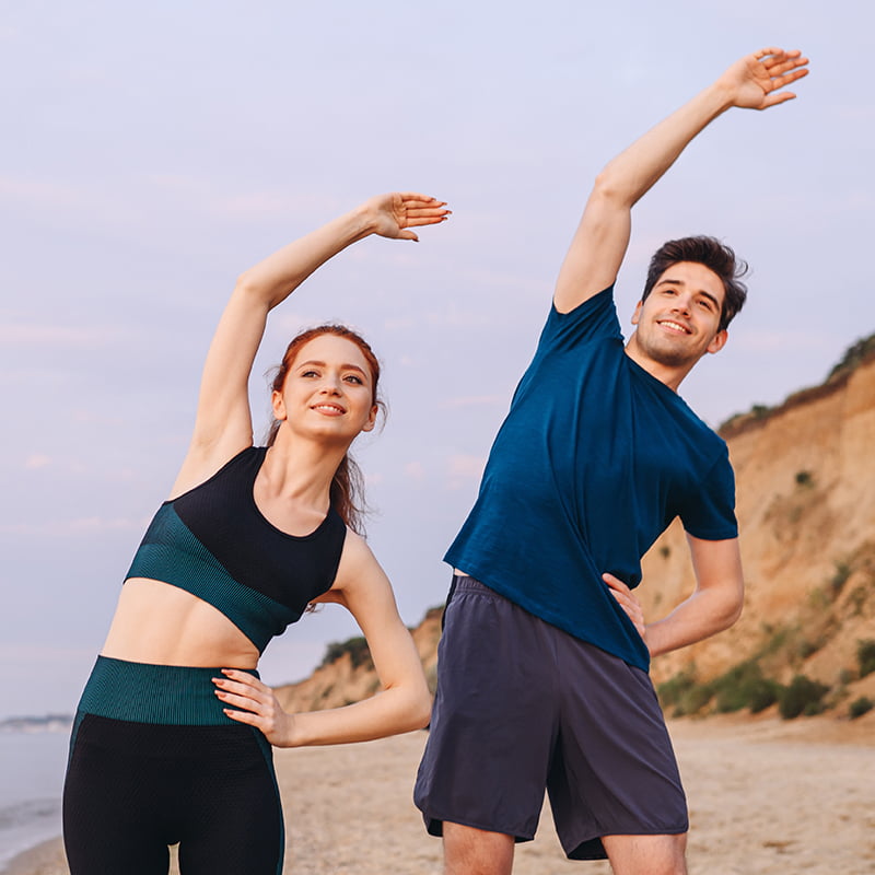 young couple doing yoga